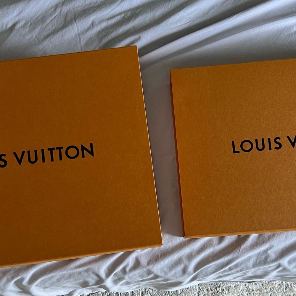 Two Louis Vuitton boxes w ribbons + one extra large Shopping bag.